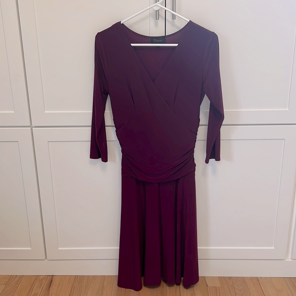 Plum ruched waist dress with 3/4 sleeve.